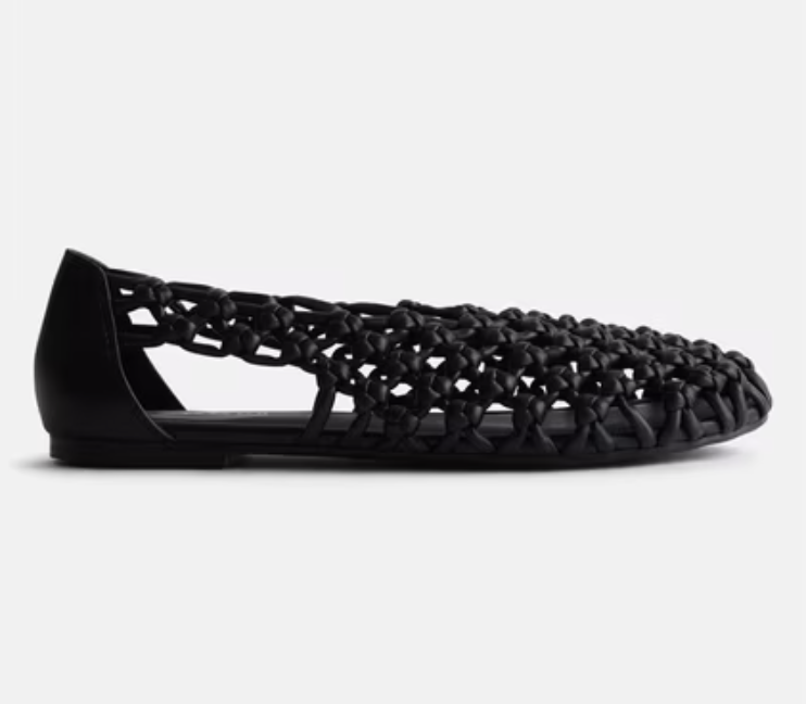 Trendy neutral-colored crochet knot ballet flats featuring a breathable woven design.