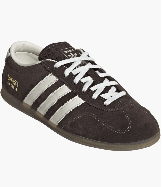 Dark brown suede Adidas Gazelle low-top sneakers.