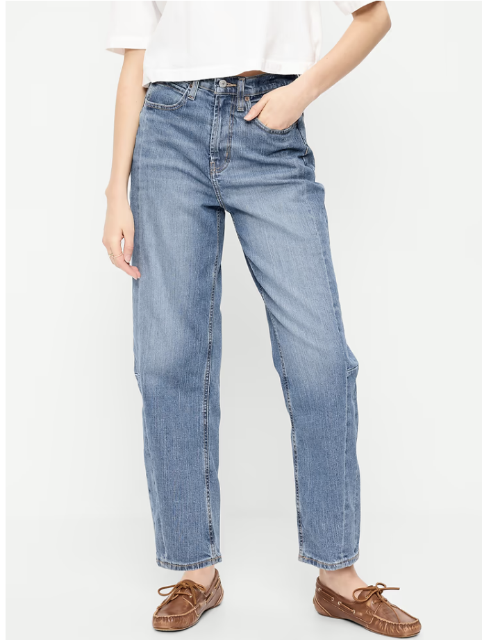 Woman wearing Old Navy high-waisted baggy barrel ankle jeans with loafers.