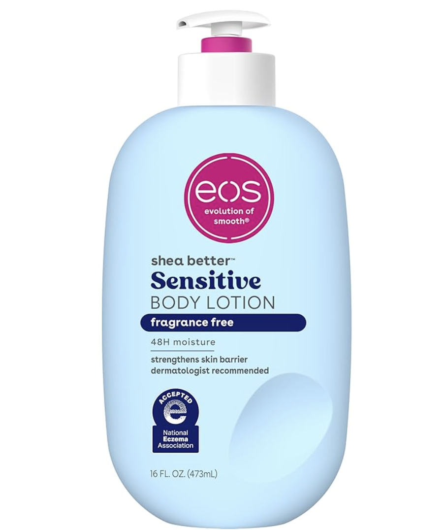 A 16 fl oz bottle of eos Shea Better Sensitive Skin Body Lotion, featuring a light blue and white label that specifies it is fragrance-free and dermatologist recommended.