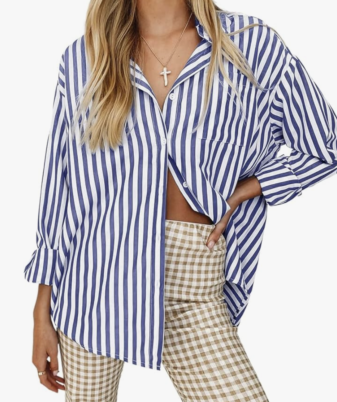 A pro stylist-recommended blue and white striped long sleeve shirt styled open over checkered trousers for a polished, layered look.
