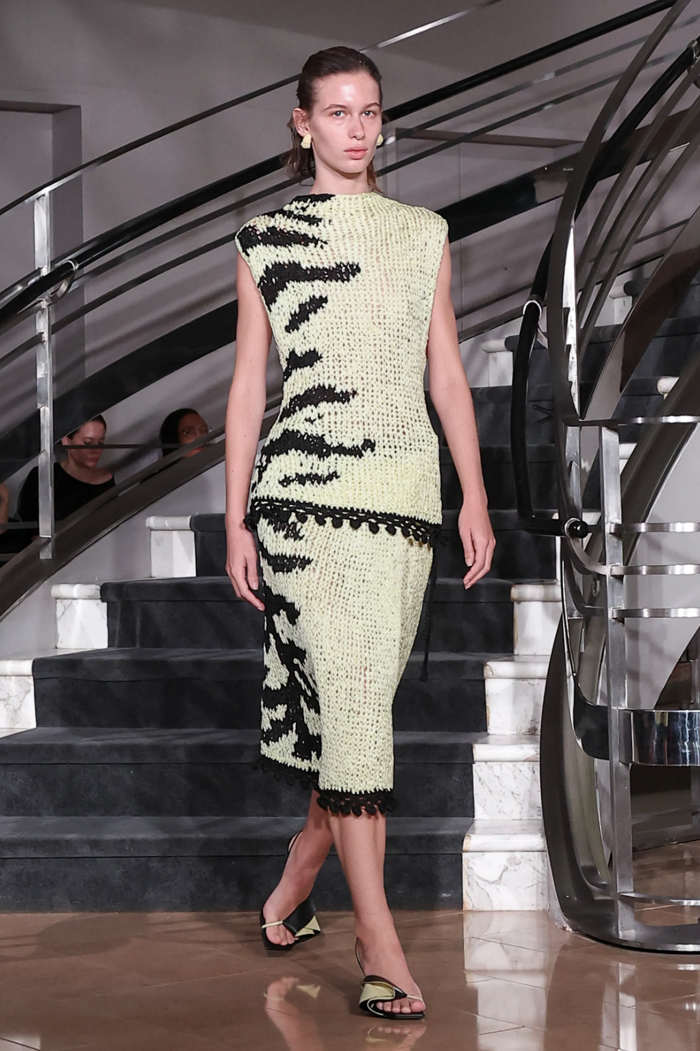 Proenza Schouler Spring 2027 runway look pairing flat sandals with a sequined gown