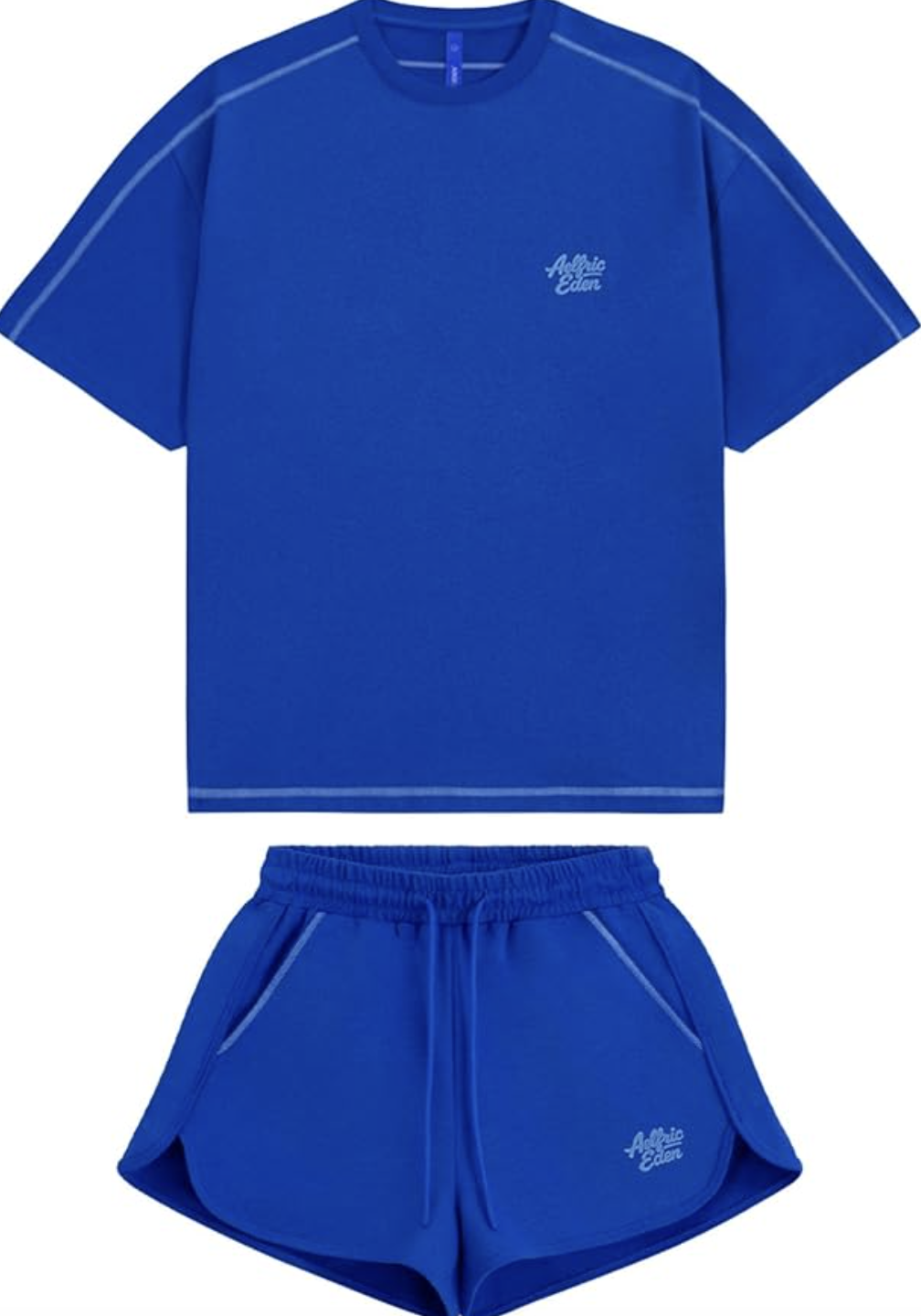 A vibrant royal blue Aelfric Eden matching lounge set featuring a relaxed short-sleeve t-shirt with white contrast stitching and a small logo, paired with matching athletic track shorts.