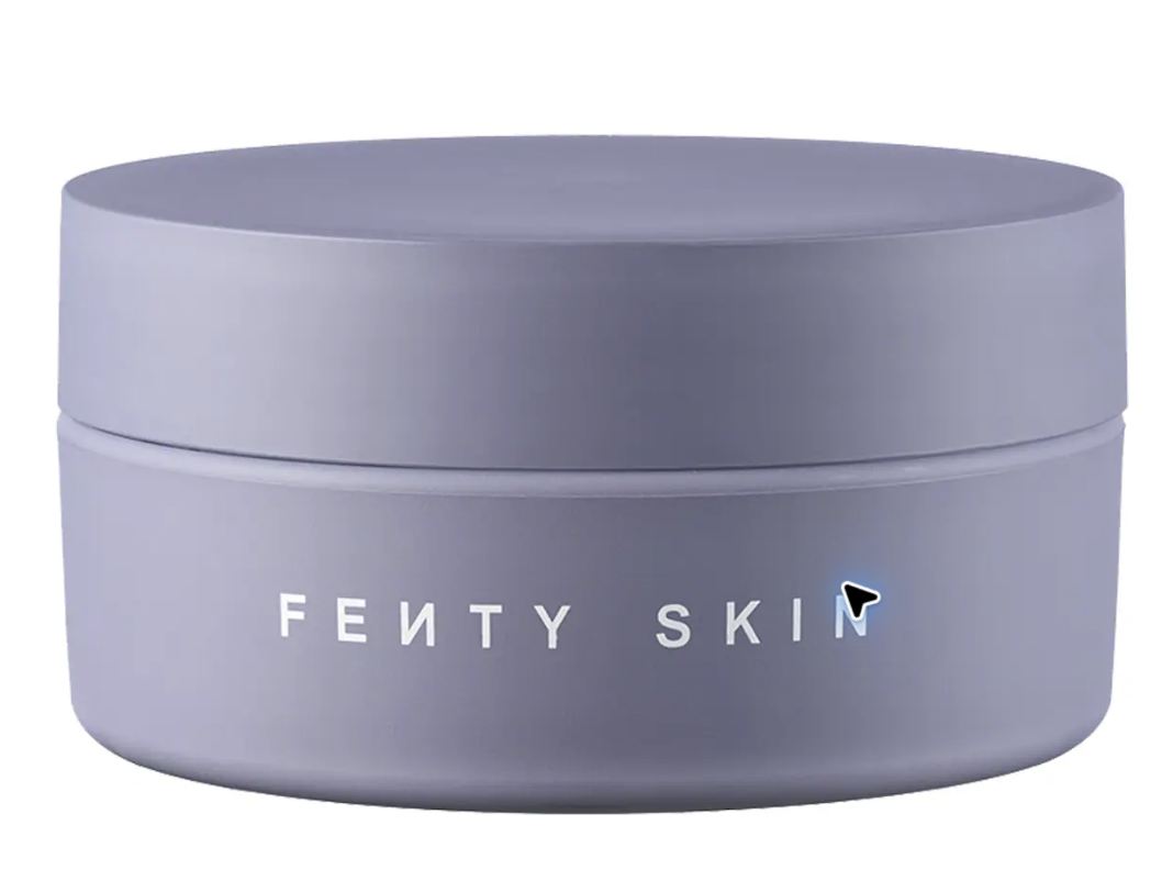 Fenty Skin Butta Drop whipped oil body cream in its refillable jar.