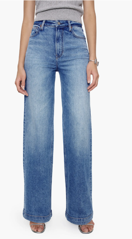 Reformation Bex Wide Leg Jeans in a light wash denim, featuring a high-rise waist and a voluminous wide-leg silhouette.