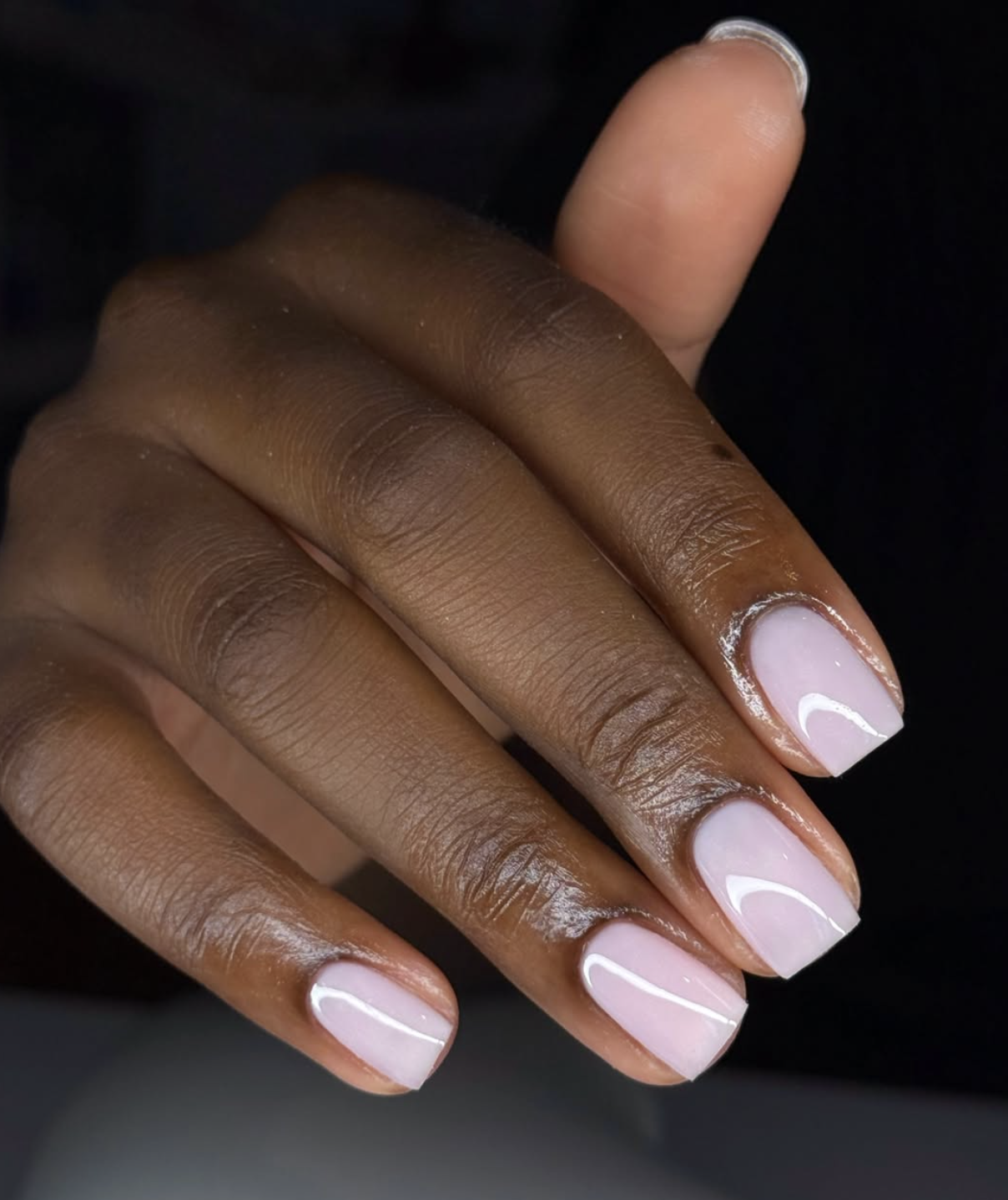 Short frosted pink winter nails with a pearly finish