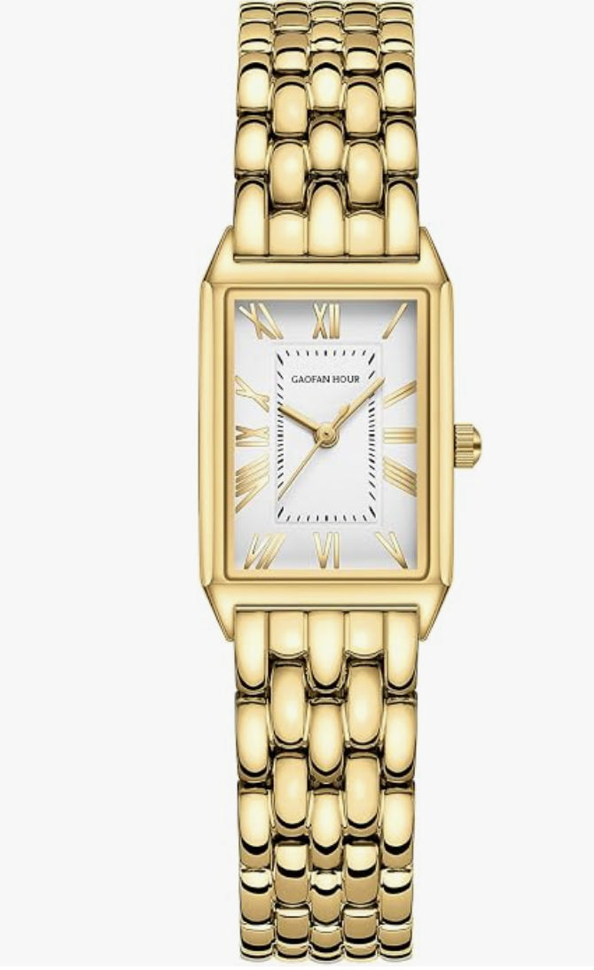 Gold vintage-accented rectangular watch with a chain-link bangle strap and Roman numeral markers set against a white background.