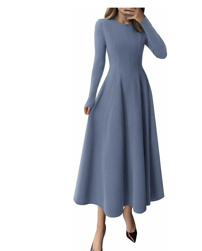 A woman wearing a dusty blue long-sleeve midi dress with a fit-and-flare silhouette and a clean crew neckline.
