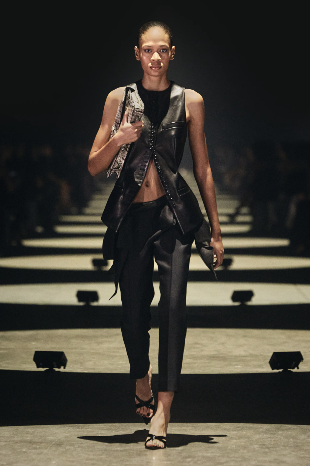 Khaite Spring 2027 runway look featuring cropped black skinny trousers