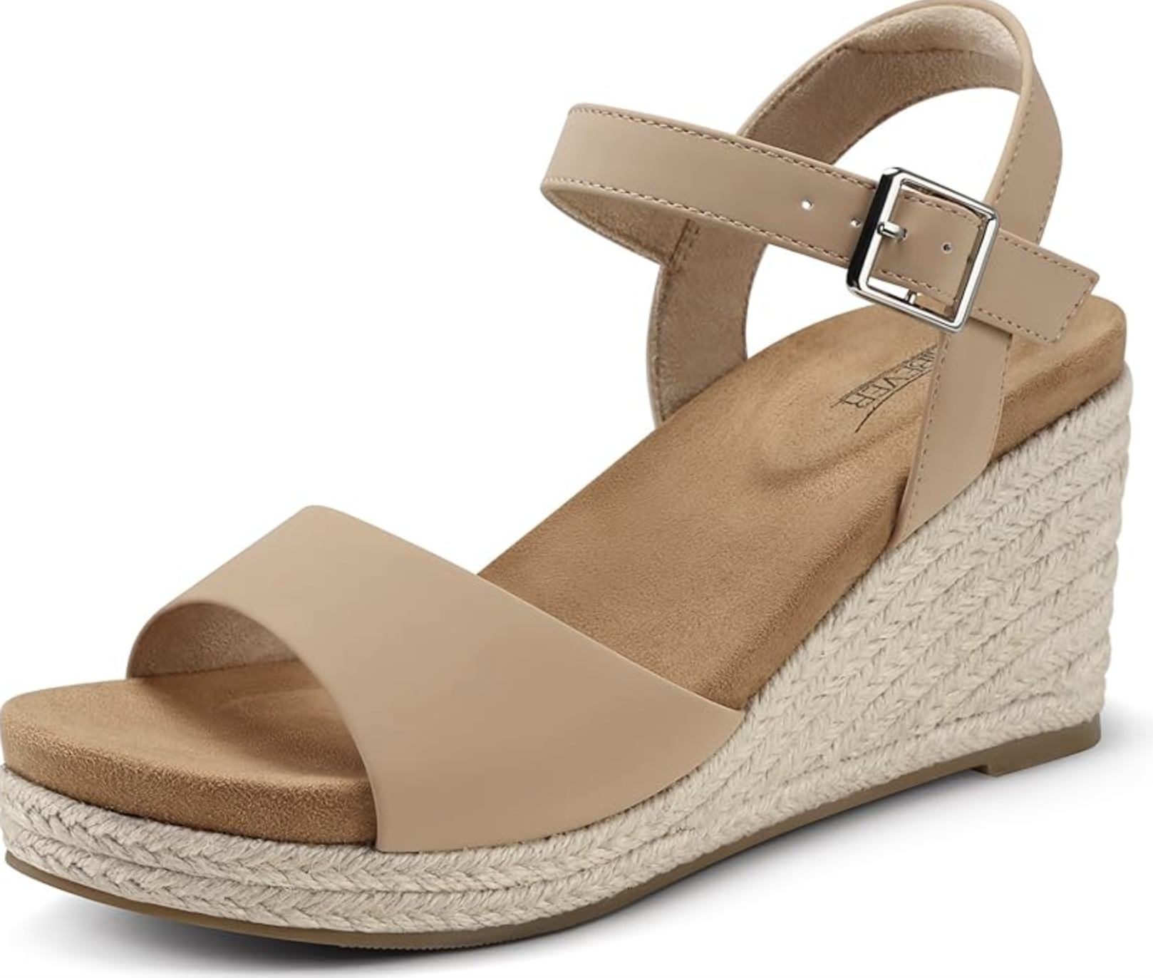 Close-up of a woman wearing light beige open-toe espadrille wedge sandals with a comfortable wide front strap, an adjustable ankle strap with a silver buckle, and a braided jute faux-cork sole.