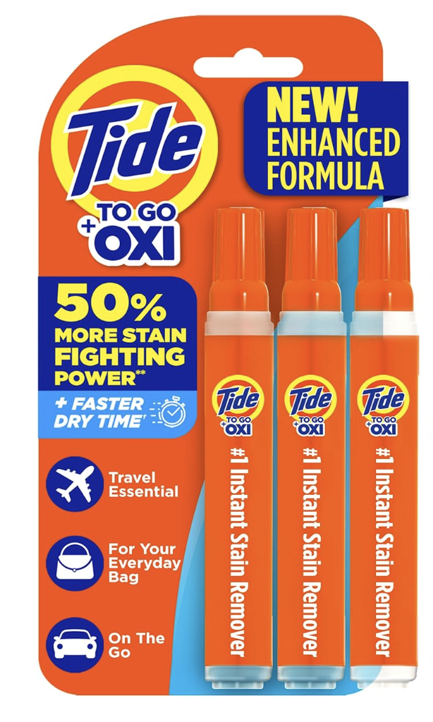 Mini stain-treatment pen in a travel emergency kit