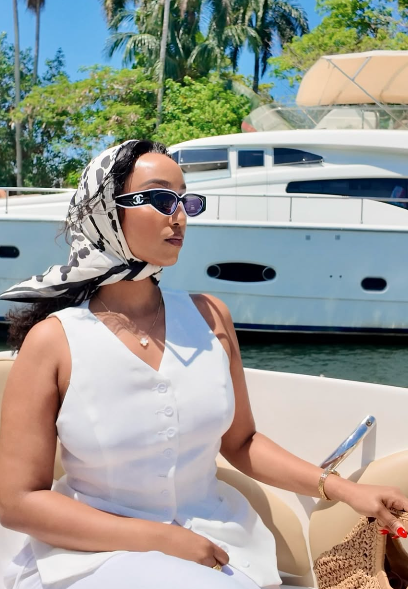 Woman posing on a yacht