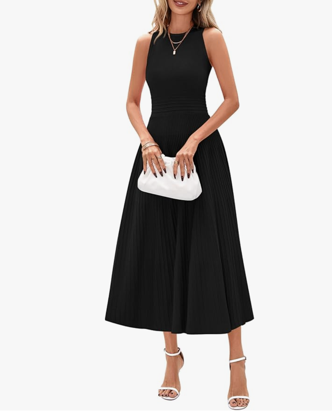 A woman wearing a burgundy long-sleeve flowy mini tunic dress with a V-neck and ruffled cuffs, styled with a brown leather clutch for a professional yet comfortable hybrid work outfit.