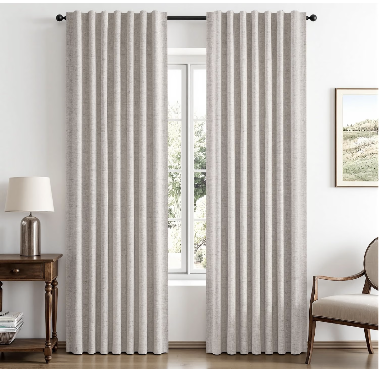 Linen-look blackout curtains hanging in a bedroom window