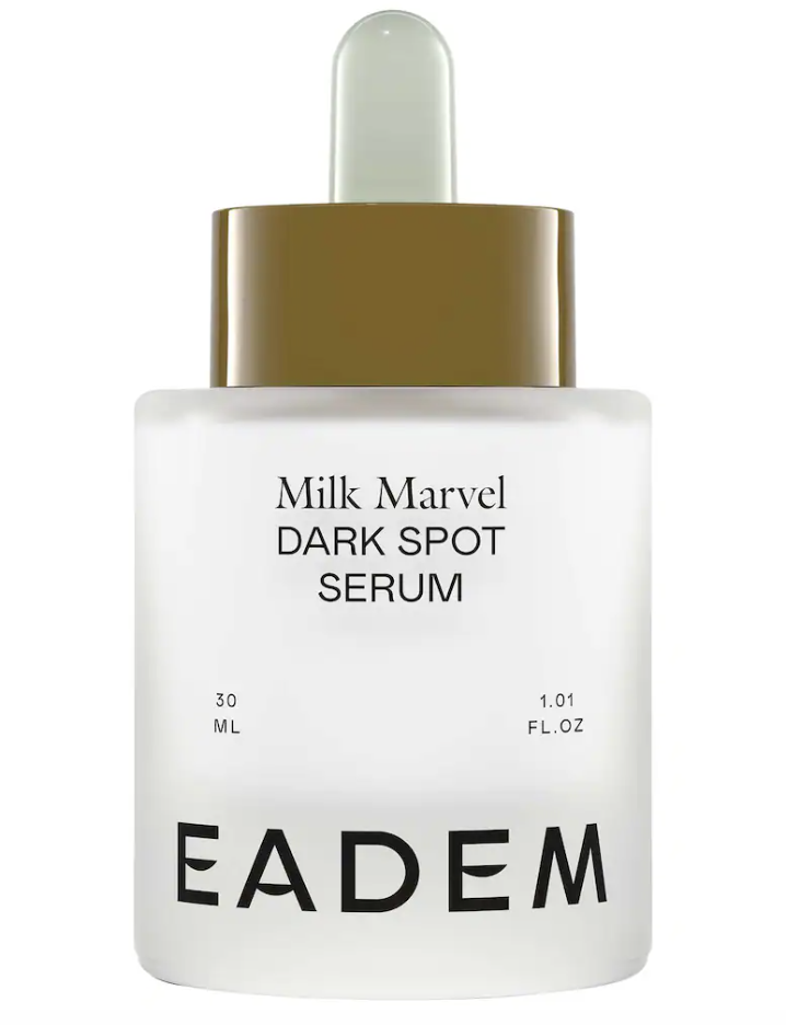 Eadem Milk Marvel Dark Spot Serum bottle with a dropper, featuring a lightweight milky texture designed with Smart Melanin technology to treat hyperpigmentation on deep skin tones.