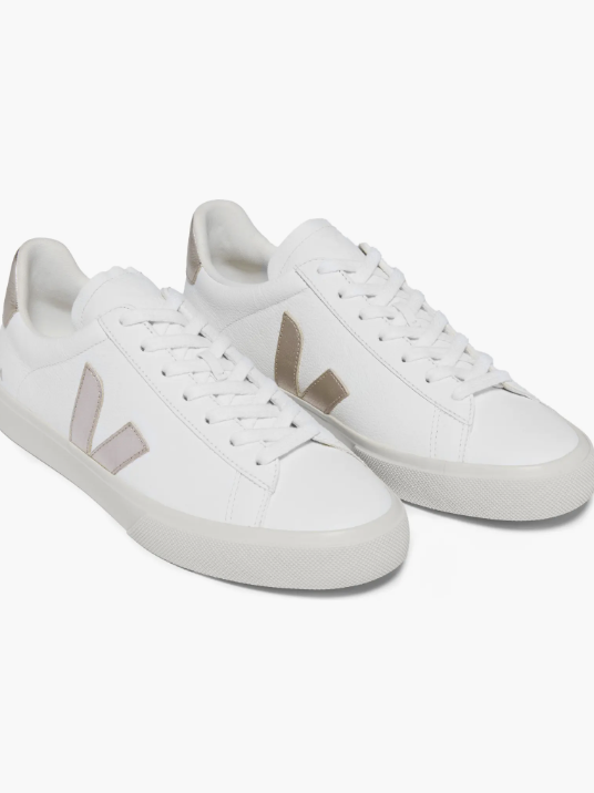 A pair of white Veja Campo leather sneakers, a top-rated choice for professional work sneakers and business-casual office outfits.