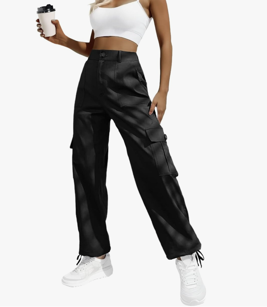 A pair of pro stylist-recommended high-waisted black cargo pants styled with white sneakers, showing a versatile base for layered casual outfits.