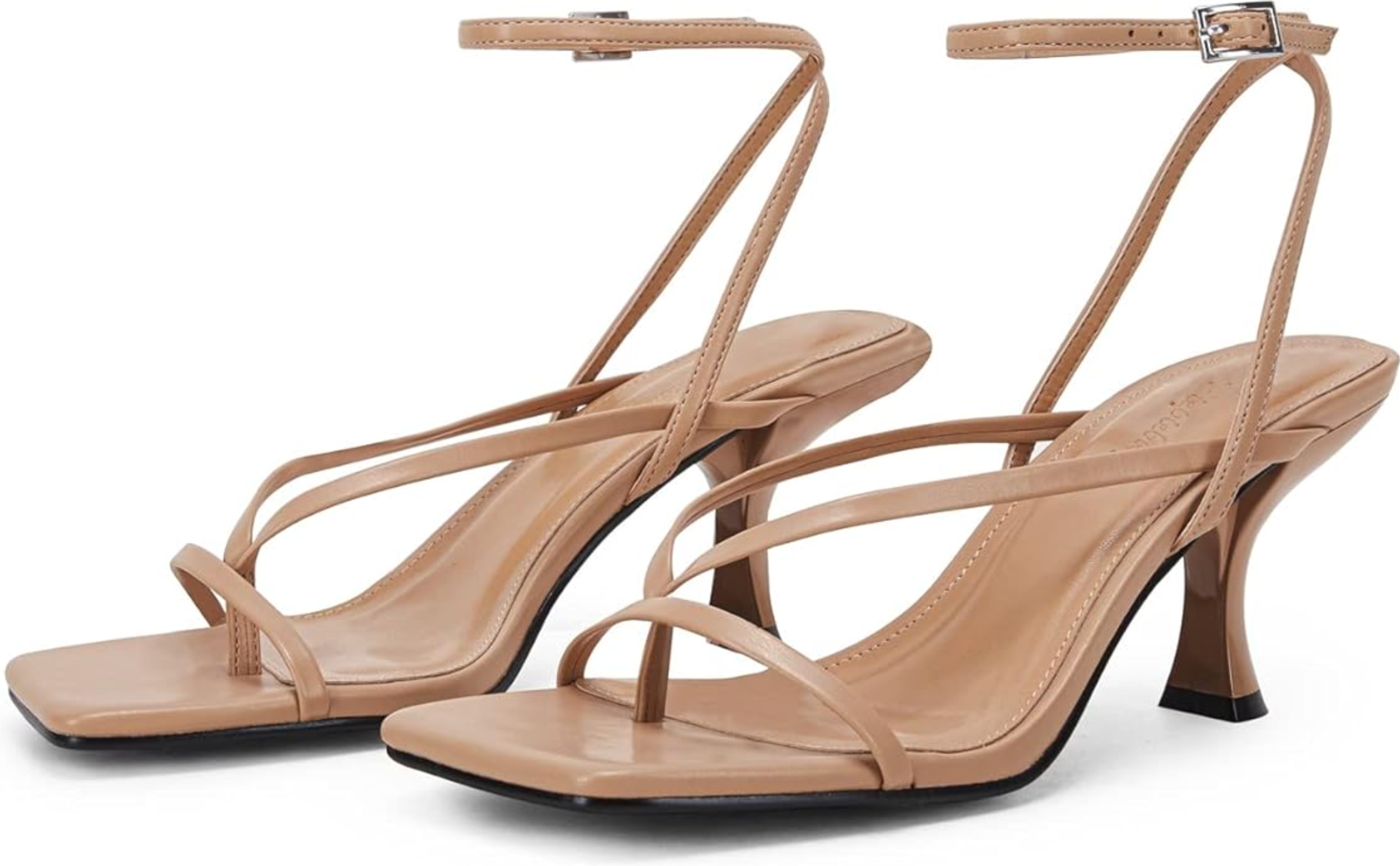 A pair of tan faux-leather lace-up sandals with a square toe, thin kitten heel, and long wrap-around ankle ties shown on a transparent background.