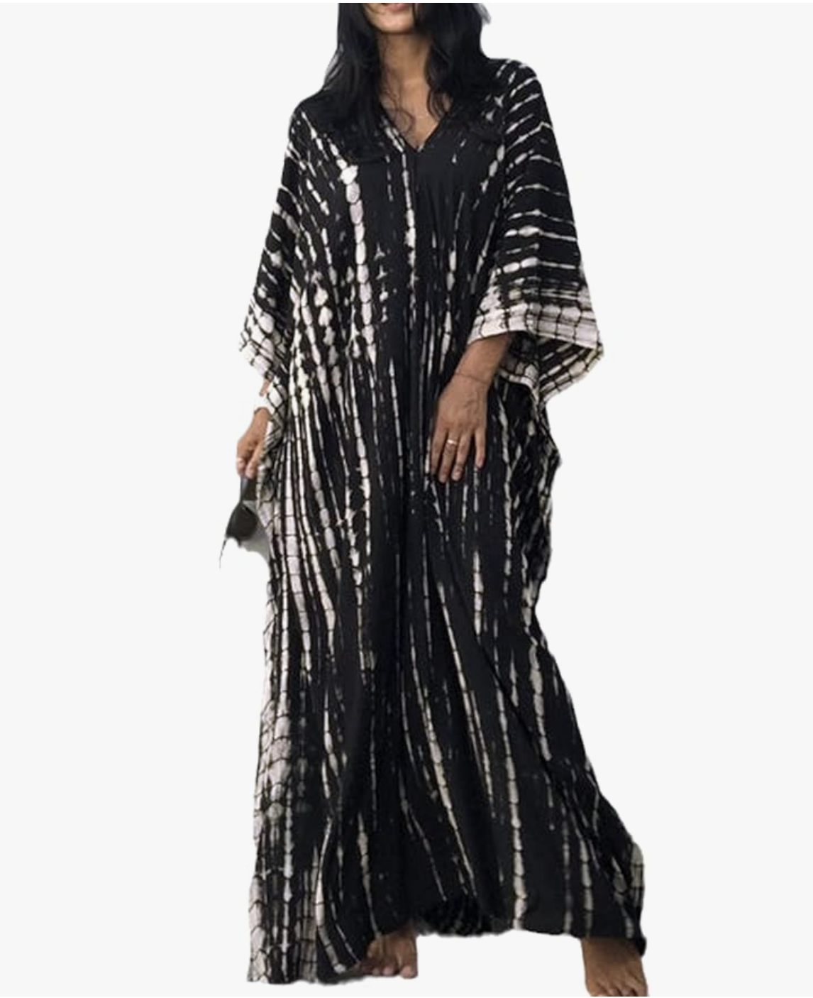 A pair of pointed-toe Mary Jane flats featuring a natural snake print, a slim ankle strap with a gold-tone circular buckle, and a low block heel, styled for a 50 plus spring capsule wardrobe.