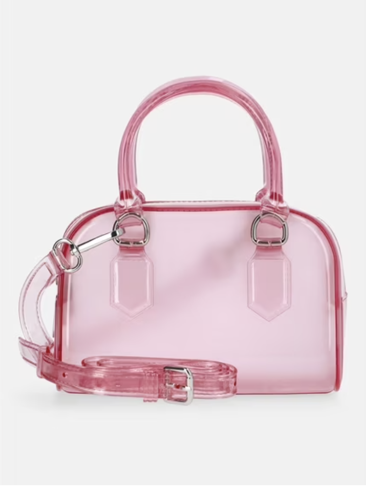 A close-up product shot of a trendy clear pink jelly mini handbag featuring a structured top handle, silver metallic hardware clasps, and an adjustable translucent pink crossbody strap.
