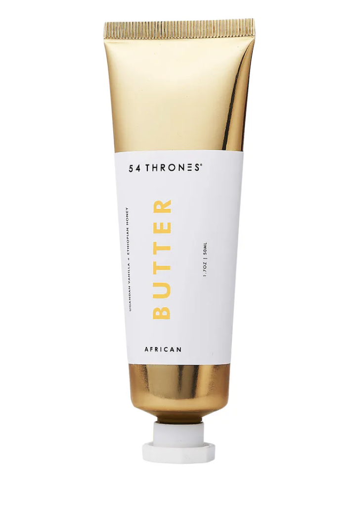 SUNDAY II SUNDAY Signature Scalp Balancing Replenishing Conditioner in a tall beige bottle, a dermatologist-tested treatment to soothe the scalp and restore moisture to natural hair and protective styles.