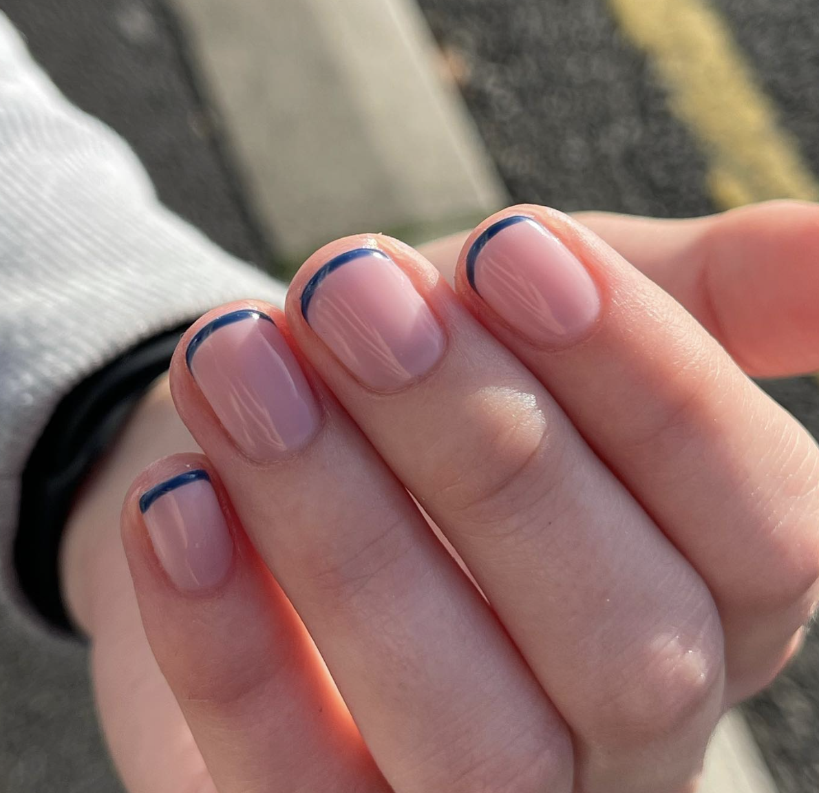 Cute navy micro french for a back-to-school manicure