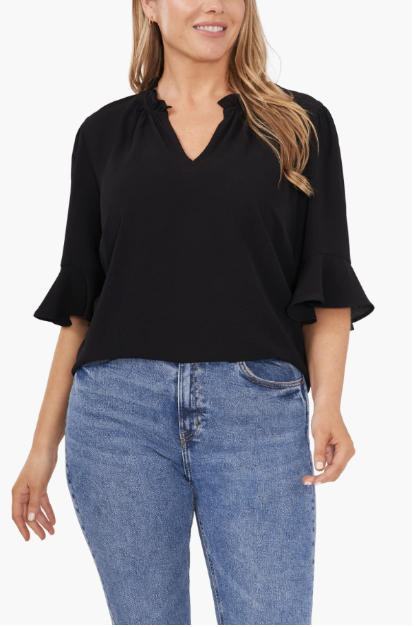 CeCe split-neck blouse with an easy fit through the shoulders and sleeves.