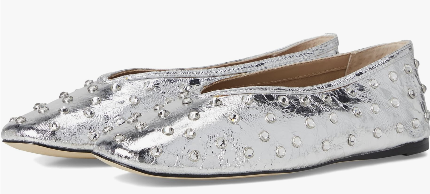 Side view of the Steve Madden Leni silver rhinestone pointed-toe ballet flats with a V-shaped vamp.