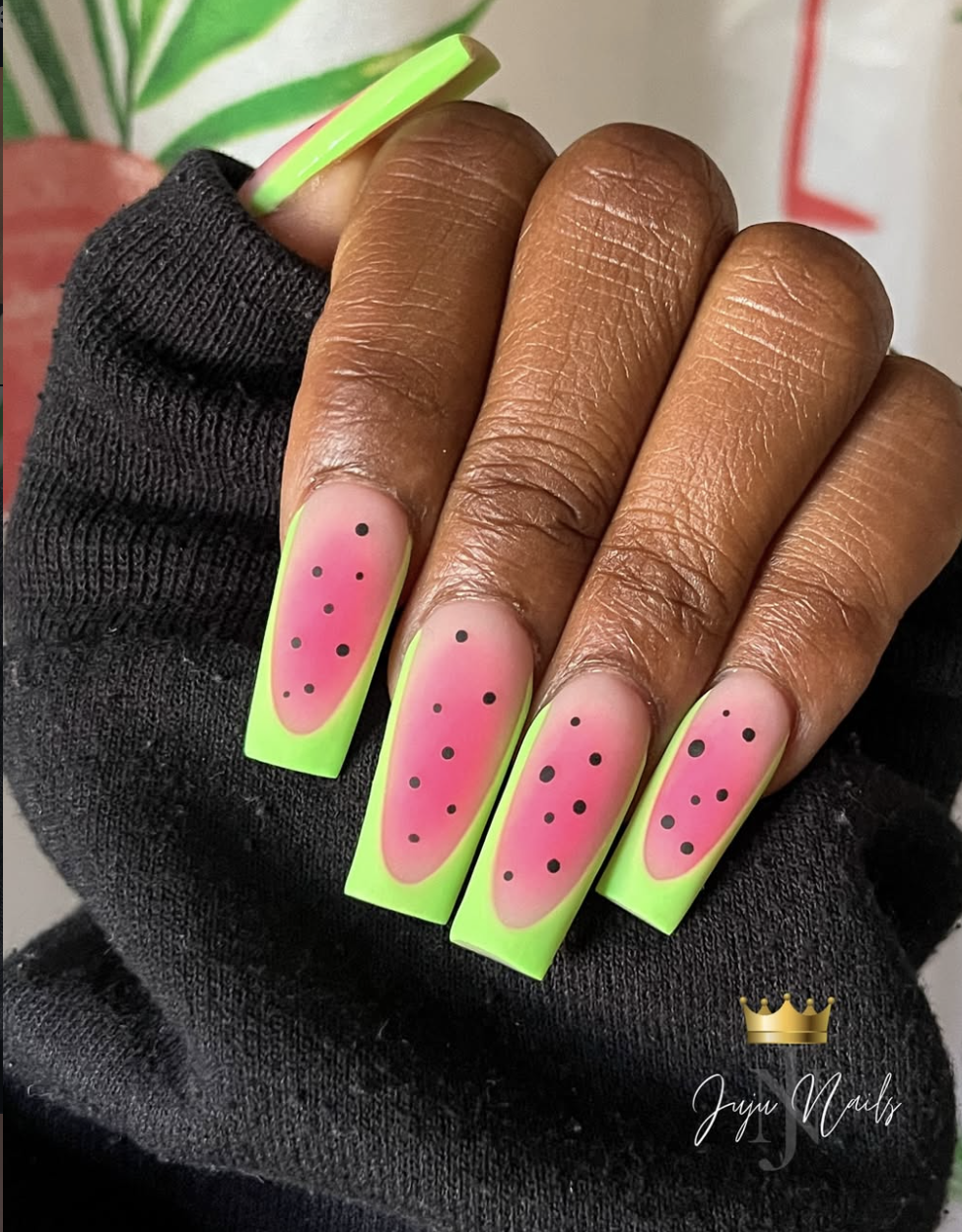 Long square nails featuring a matte watermelon design with a vibrant neon green outer border and a pink gradient center dotted with black seeds, showcasing cute June nail ideas.