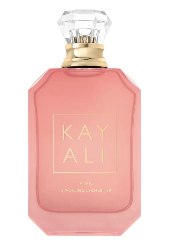 A matte pink bottle of KAYALI Eden Sparkling Lychee | 39 perfume with a clear, diamond-shaped cap and gold label detailing.