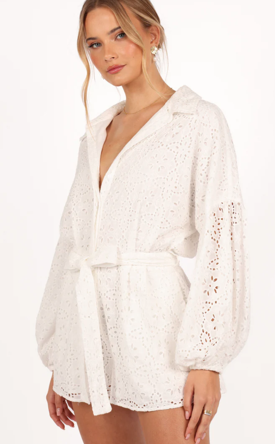 woman wearing a white romper