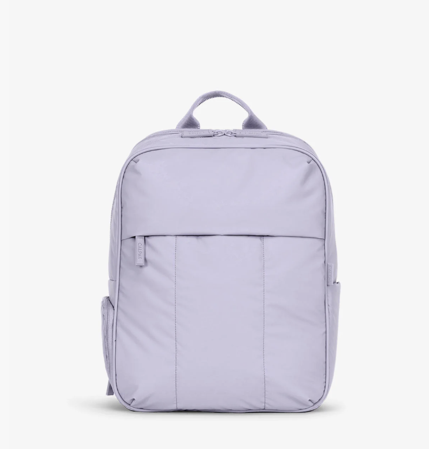 CALPAK Luka laptop backpack with matte exterior, organization pockets and luggage sleeve.
