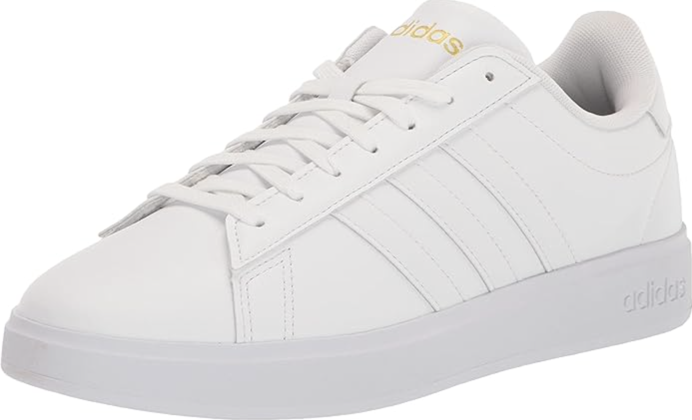 A product photo of the adidas Women's Grand Court 2.0 Tennis Shoe in all-white, featuring the iconic three-stripe design and a clean, low-profile silhouette.
