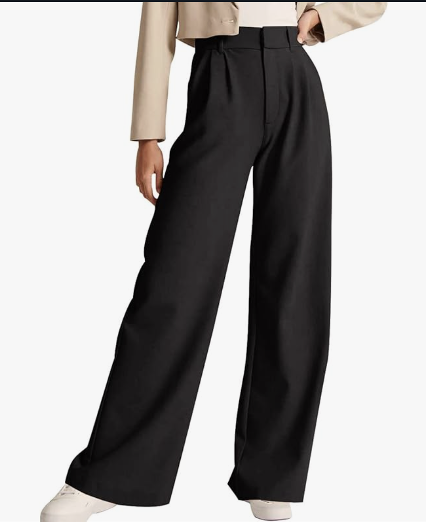A pair of black high-waisted wide-leg trousers with a structured waistband and front pleats, styled as a versatile wardrobe basic for work or evening outfits.