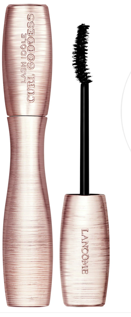 A metallic pink tube of Lancôme Lash Idôle Curl Goddess Mascara shown with the curved wand applicator displayed to the right.