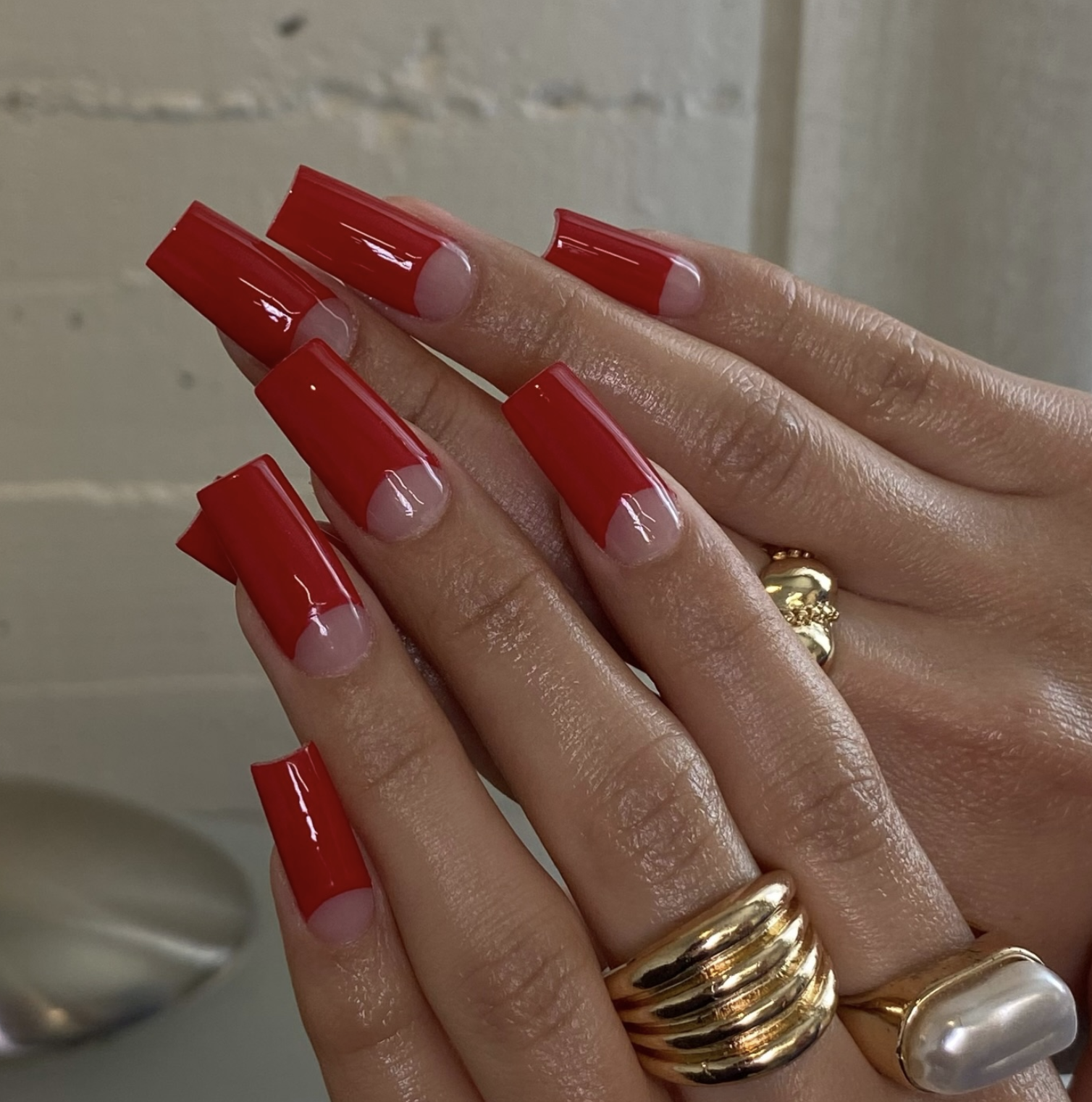 Reverse red french manicure nail design
