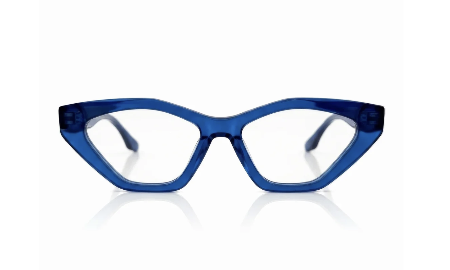 Royal blue Vicci Lucia eyeglass frames worn as a colorful neutral