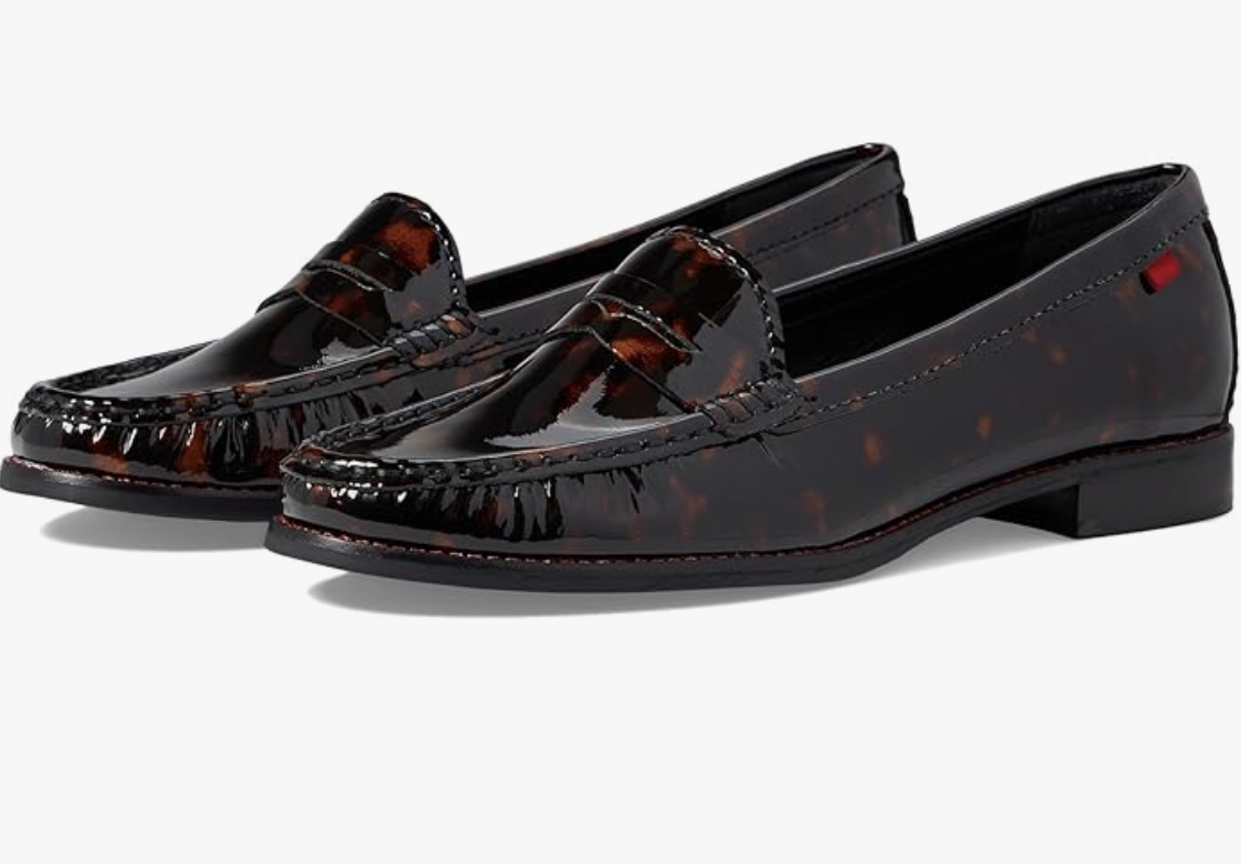 A pair of Amazon genuine leather comfort slip-on penny loafers in a dark brown tortoise-shell patterned patent finish—a classic footwear staple for an office capsule wardrobe.