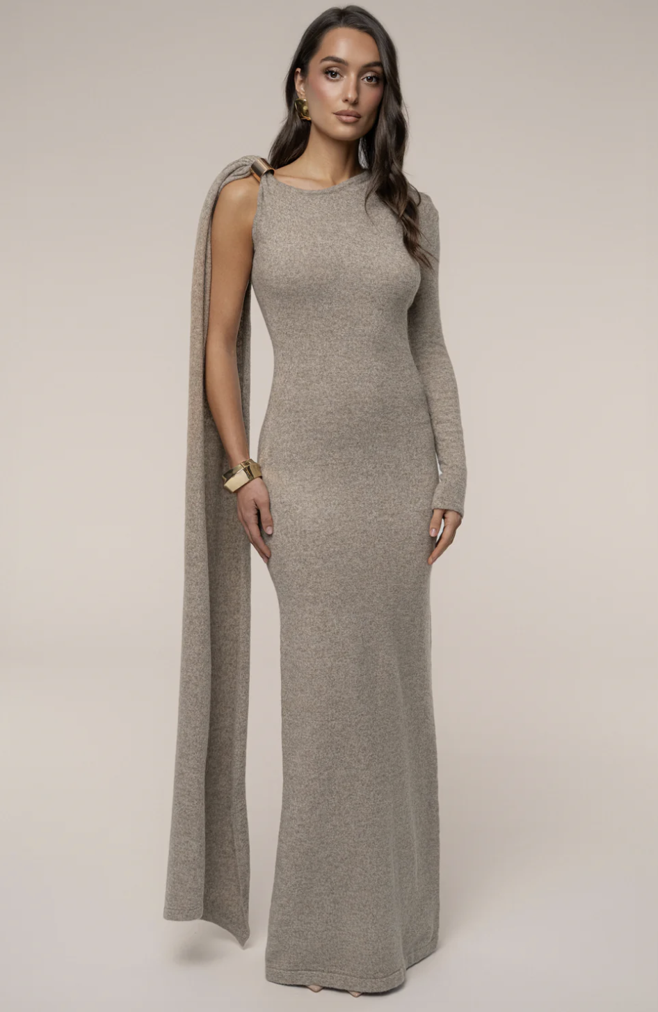 Taupe sleeveless drape maxi dress with a high neckline, a versatile spring wardrobe essential for 2026.