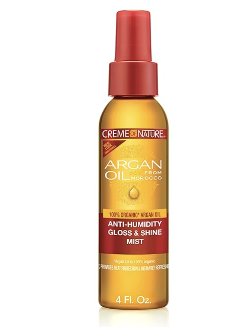 Spray bottle of Creme of Nature Argan Oil Anti-Humidity Gloss & Shine Mist with a red cap.