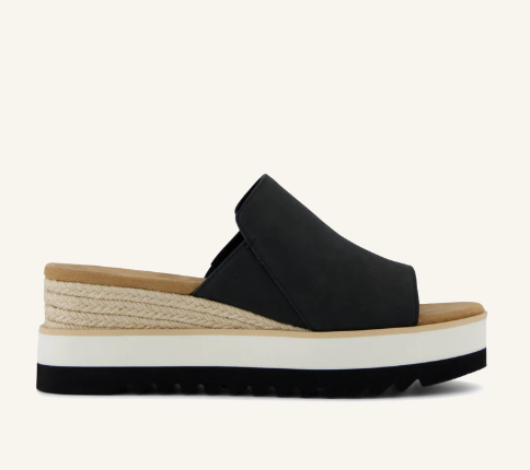 Black leather TOMS Diana Mule wedge sandals with a rope-wrapped platform and sawtooth rubber outsole for walking comfort.