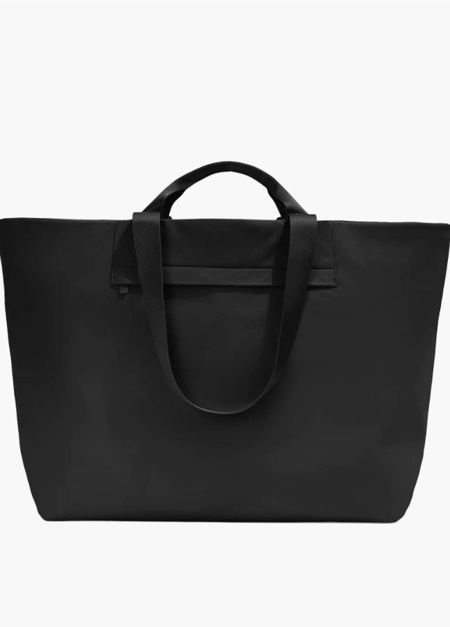 Away Large Featherlight Tote with a 16-inch laptop sleeve and luggage-handle sleeve.