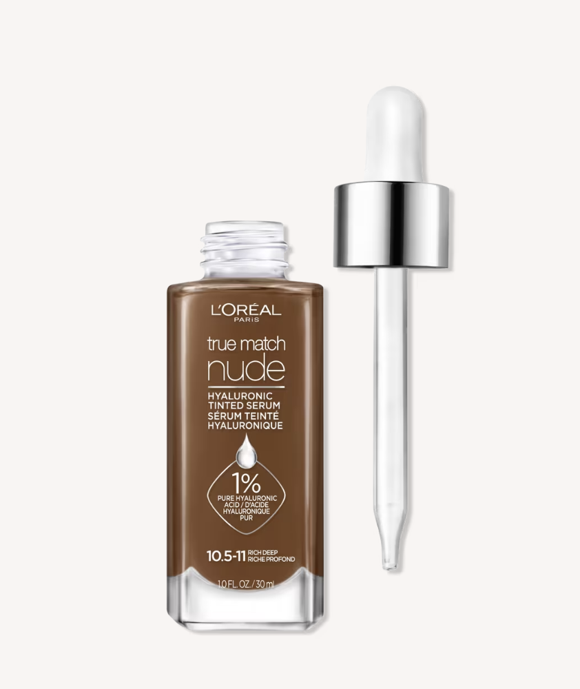 A close-up product shot of the L'Oréal Paris True Match Nude Hyaluronic Tinted Serum bottle with its dropper applicator, showing the liquid foundation formula against a clean background.