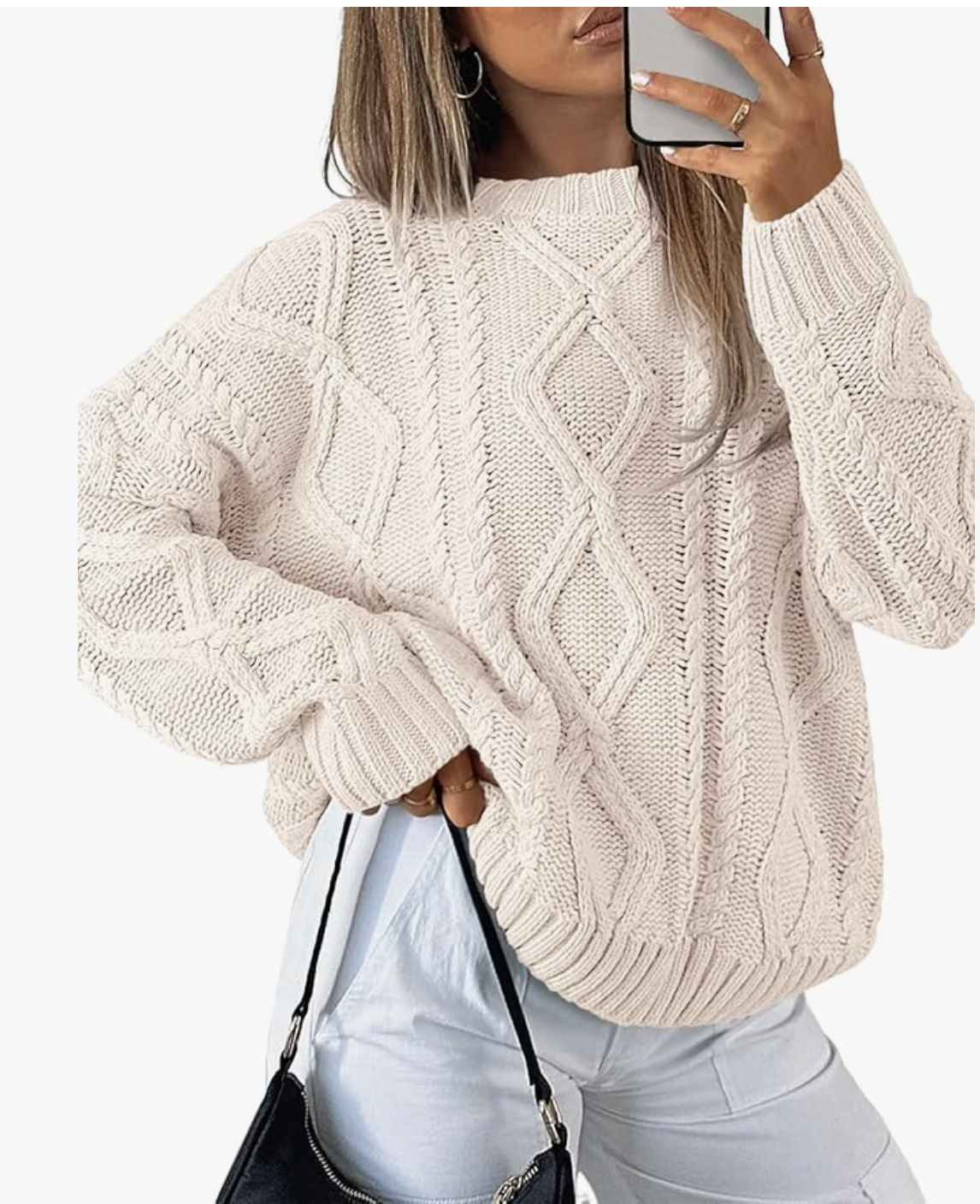 Trendy Queen cable-knit sweater styled for fall, featured in an Autum Love guide