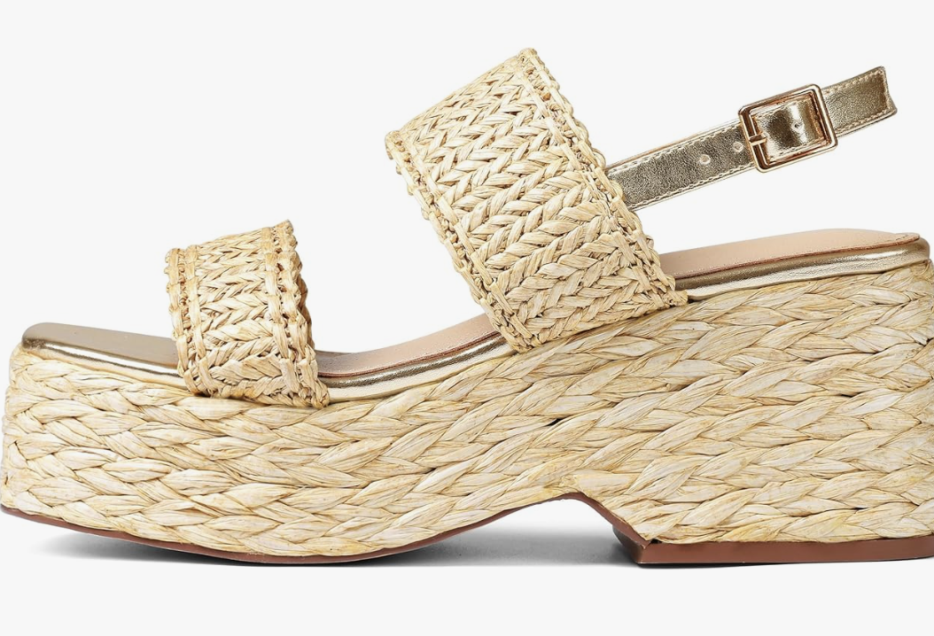 A pair of beige raffia platform wedge sandals with a woven texture and gold trim, perfect for an elevated summer BBQ outfit.