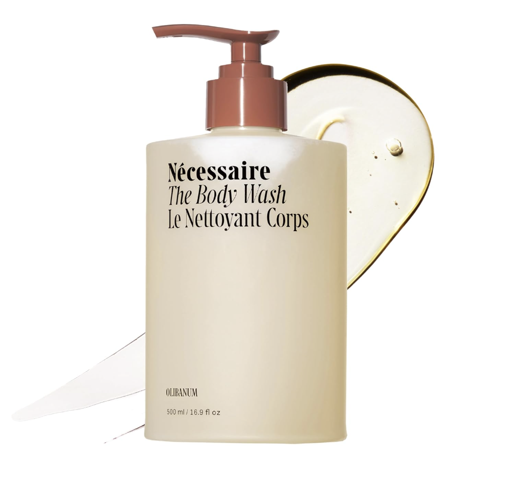 Nécessaire The Body Wash bottle styled in a simple shower setting.