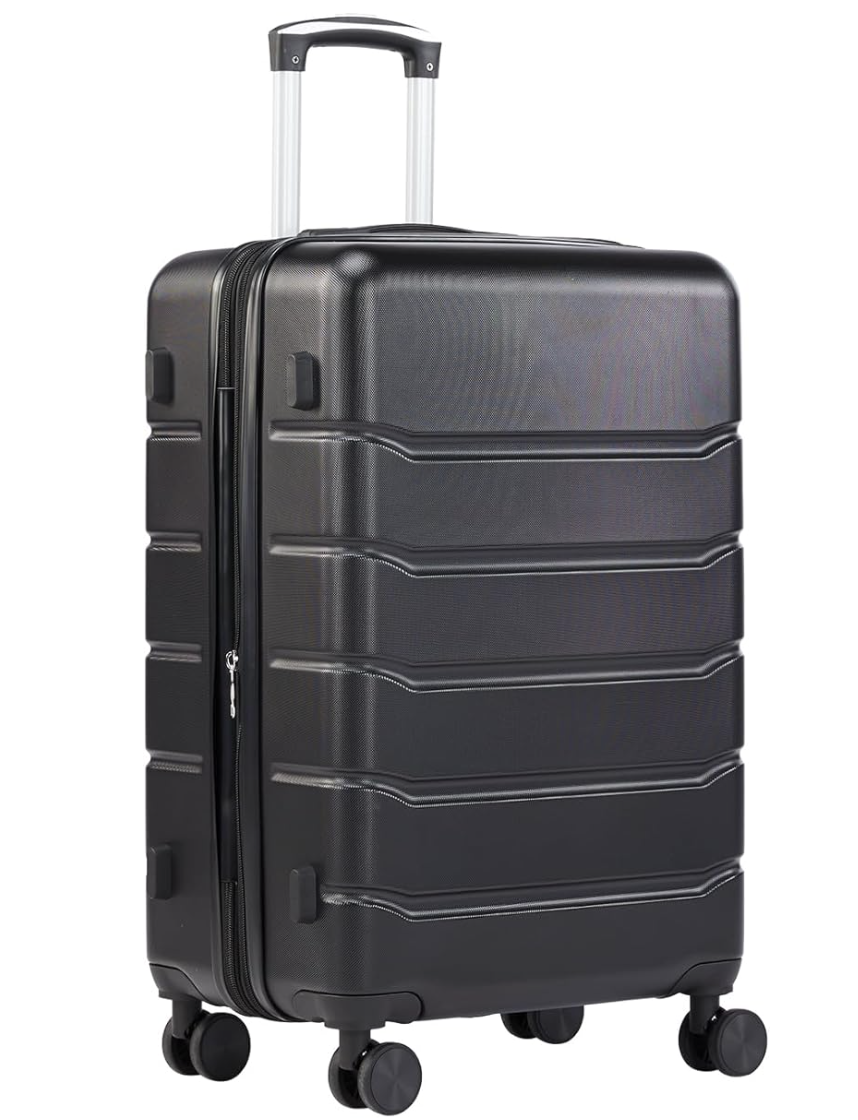 A close-up of a sleek, black hardshell carry-on suitcase featuring a textured horizontal grooved design and multidirectional spinner wheels.