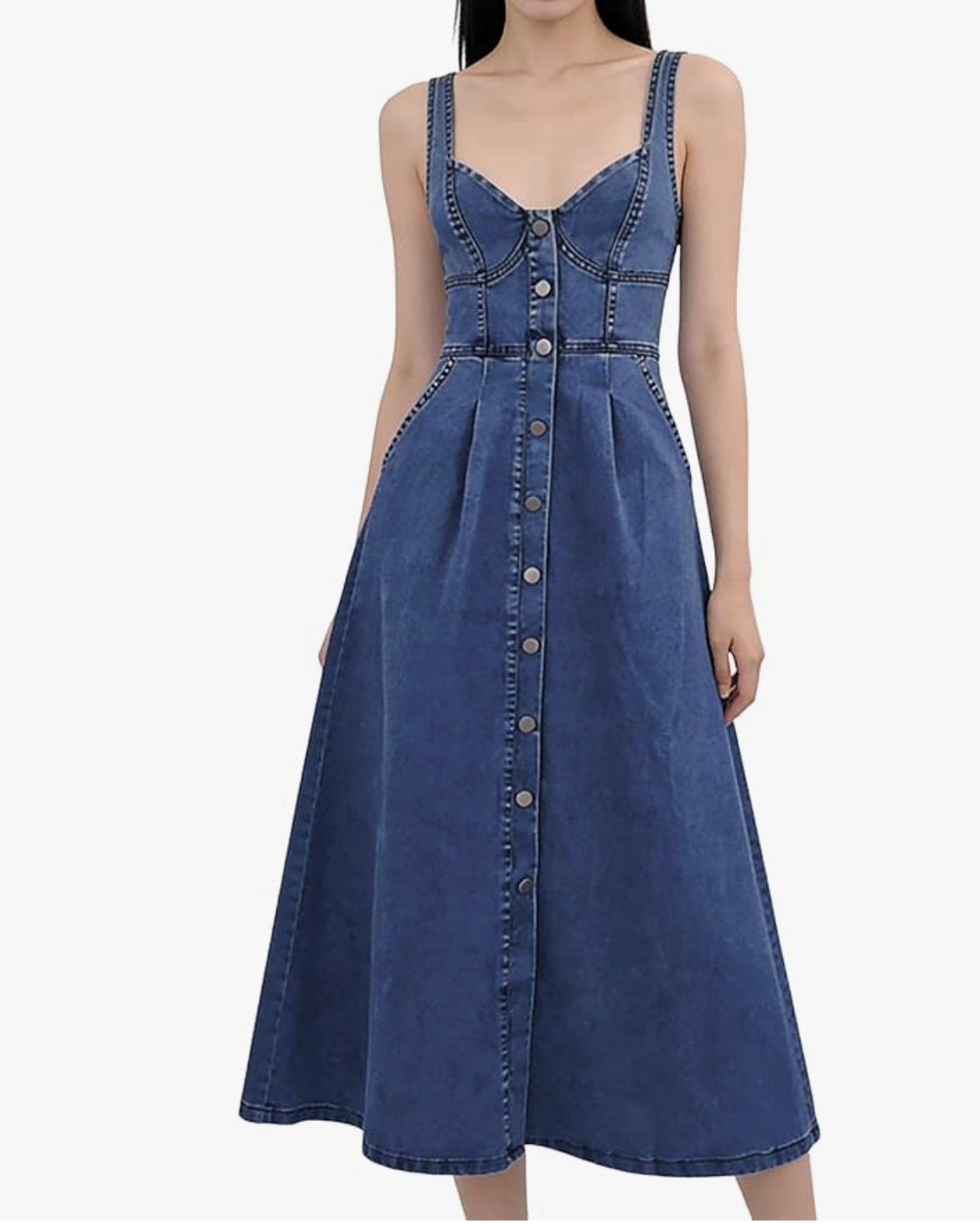 A woman wearing a dark wash sleeveless button-down denim midi dress from Amazon, featuring a structured collar and a flared skirt.