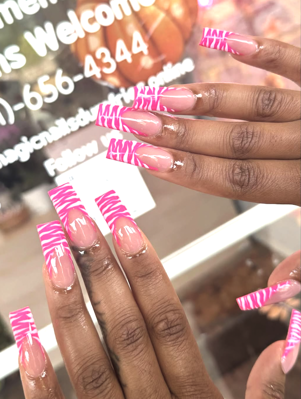 Nude nails with double hot-pink French tip lines
