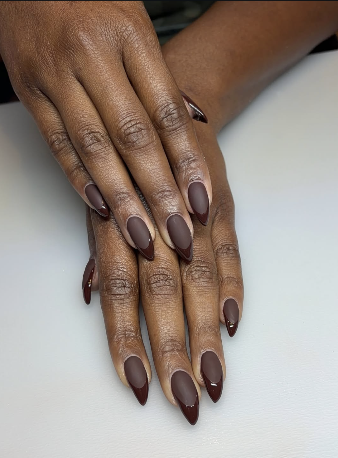 Glossy chocolate brown October nails in a warm fall shade